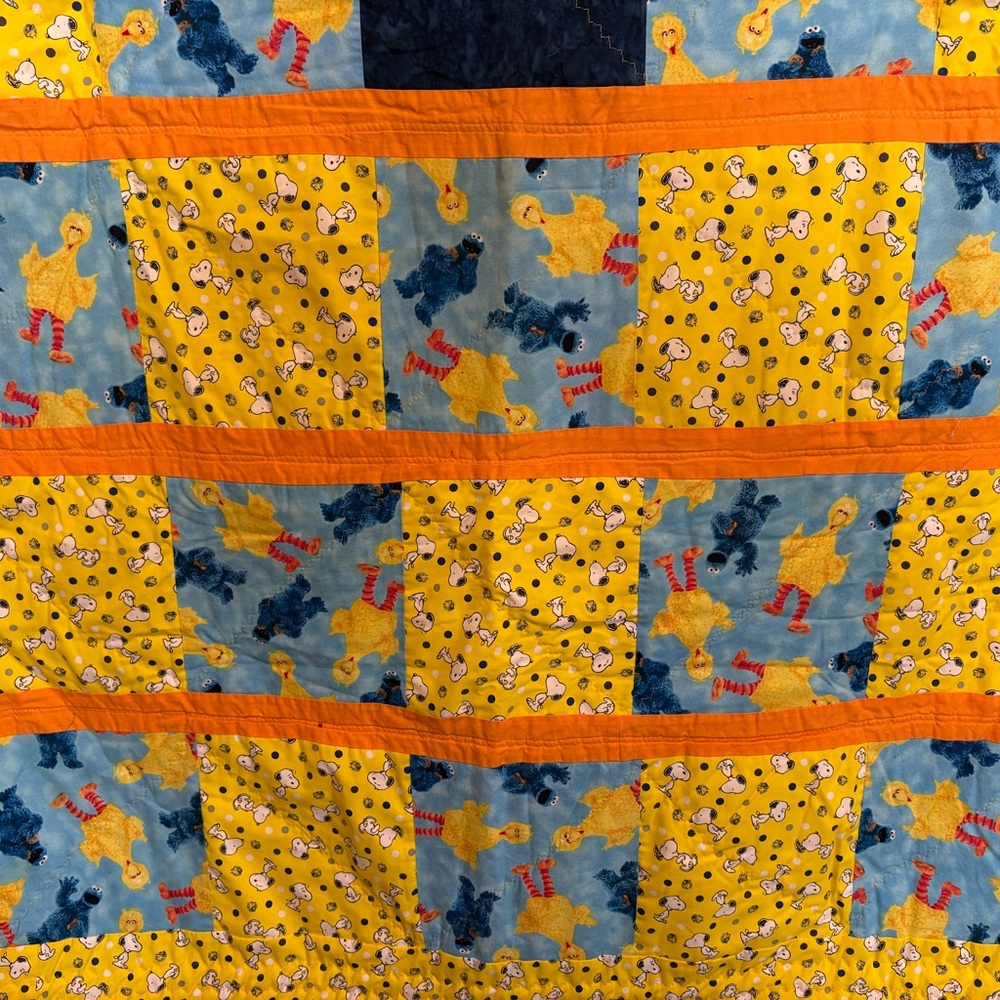 Children's Yellow & Blue Patchwork Quilt with Orange Trim - Character Print